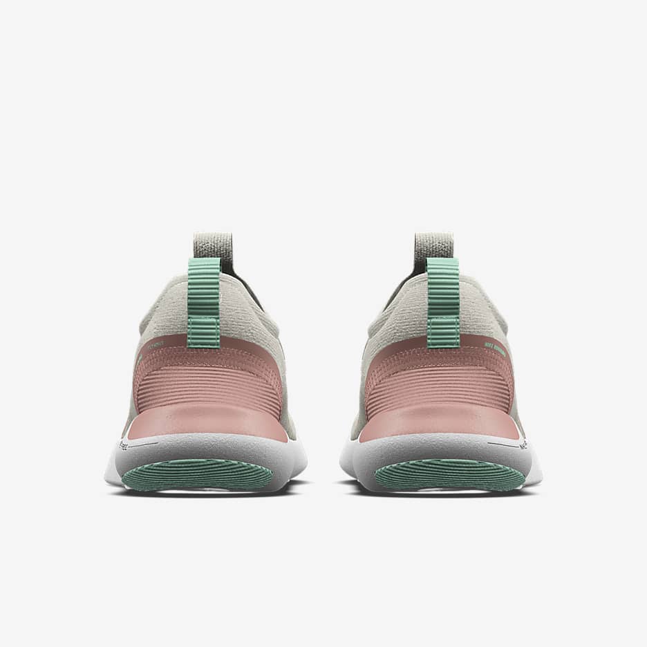 Nike running free run commuter trainers in pink hotsell